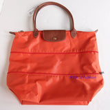 Longchamp Le Pliage Expandable Tote Orange