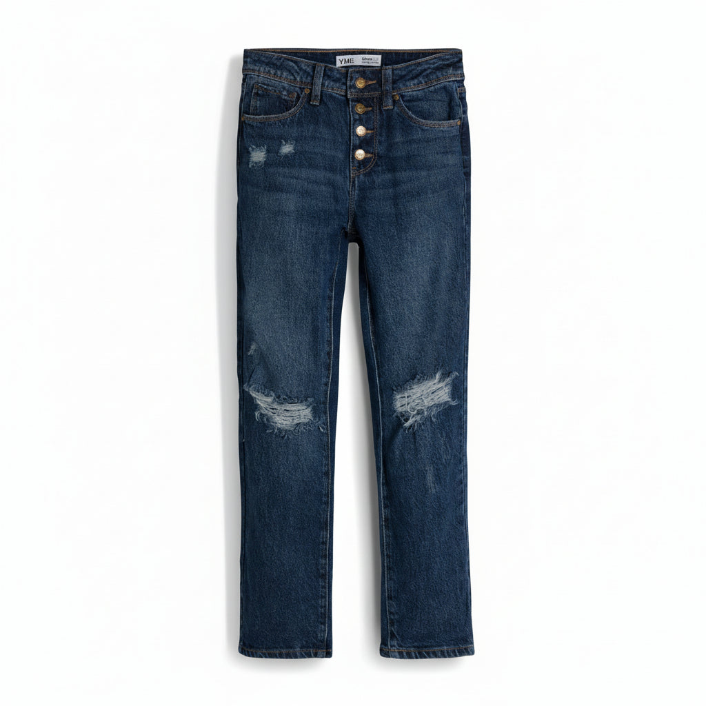 Blue jeans with button details on a light gray background