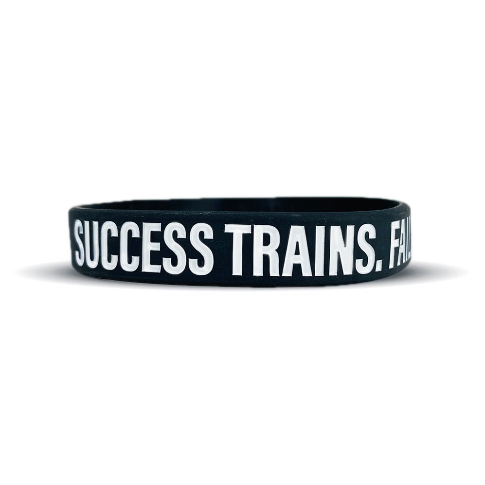 Success Trains. Failure Complains. Wristband