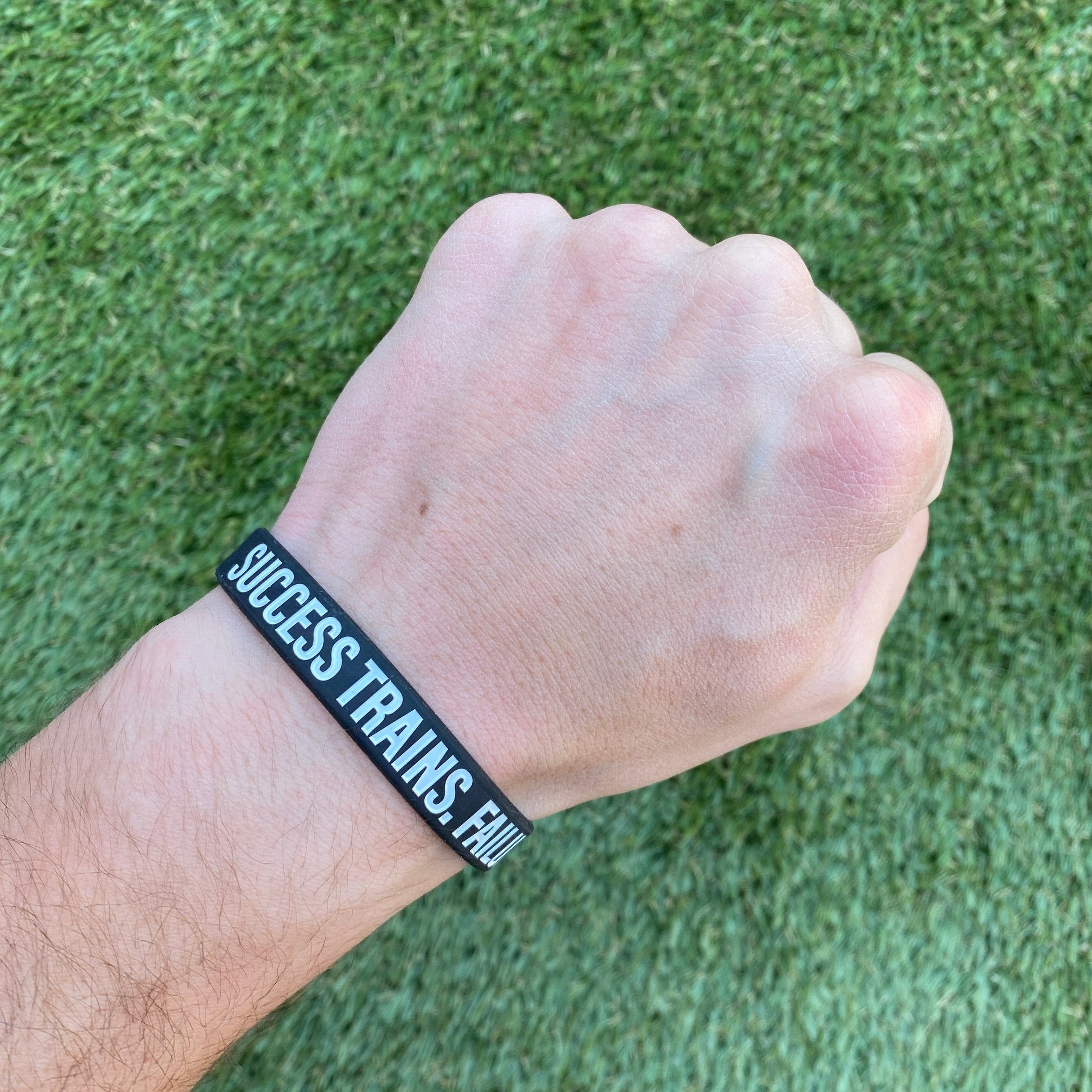 Success Trains. Failure Complains. Wristband
