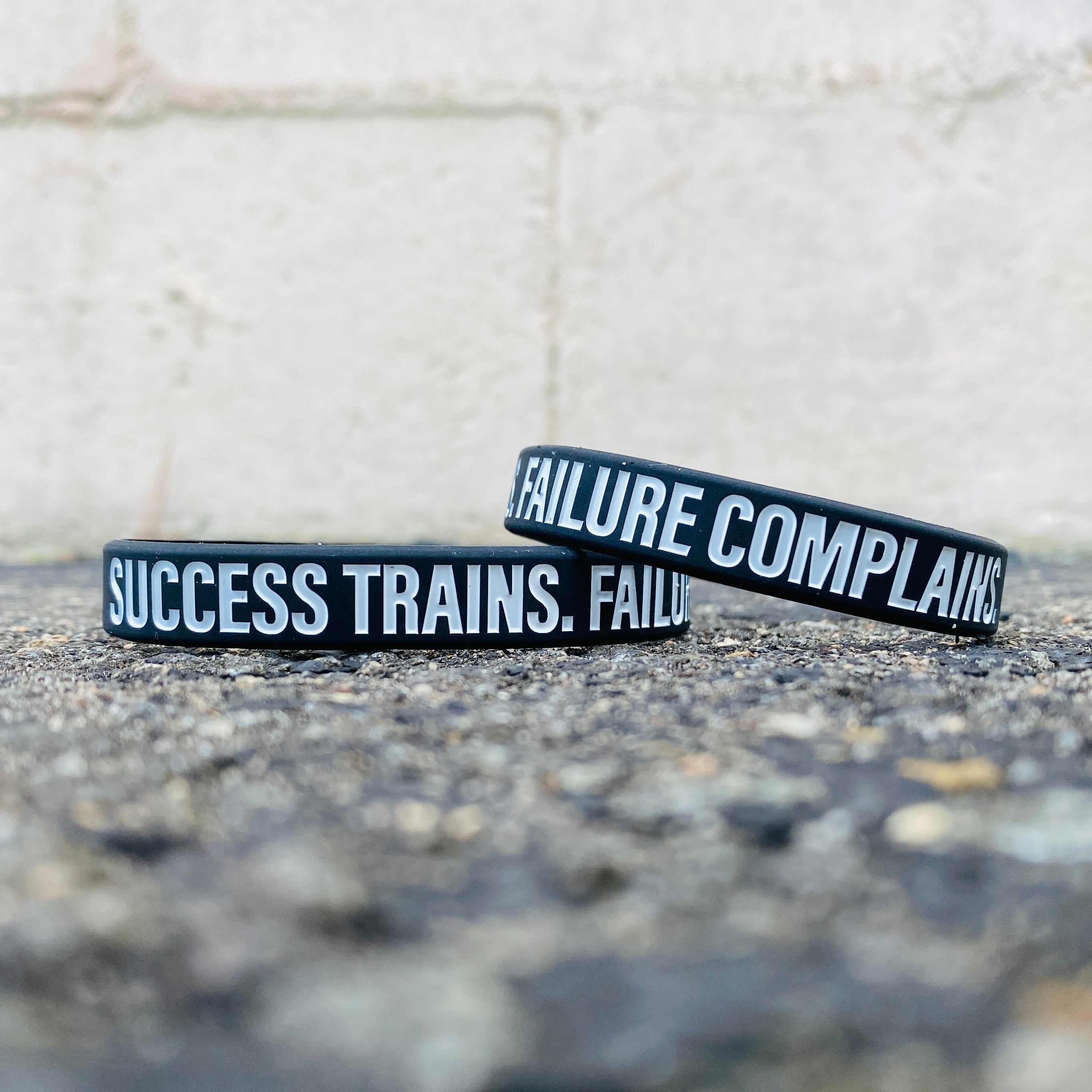 Success Trains. Failure Complains. Wristband