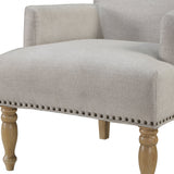 Upholstered Accent Chair with Recessed Arms, Nailhead Trim and Turned Legs
