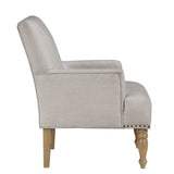 Upholstered Accent Chair with Recessed Arms, Nailhead Trim and Turned Legs