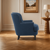 Upholstered Club Chair with Nailhead Trim and Tufted Back