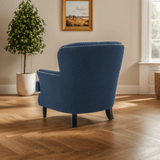 Upholstered Club Chair with Nailhead Trim and Tufted Back